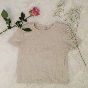 Beige striped shirt .